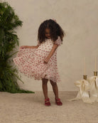 Girl wearing the Noralee Dottie Dress | Ruby Bows