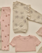 Styled flat lay of the Ruffle Sweatshirt | Big Daisy from Rylee + Cru and Rylee + Cru AW '26 Play Collection