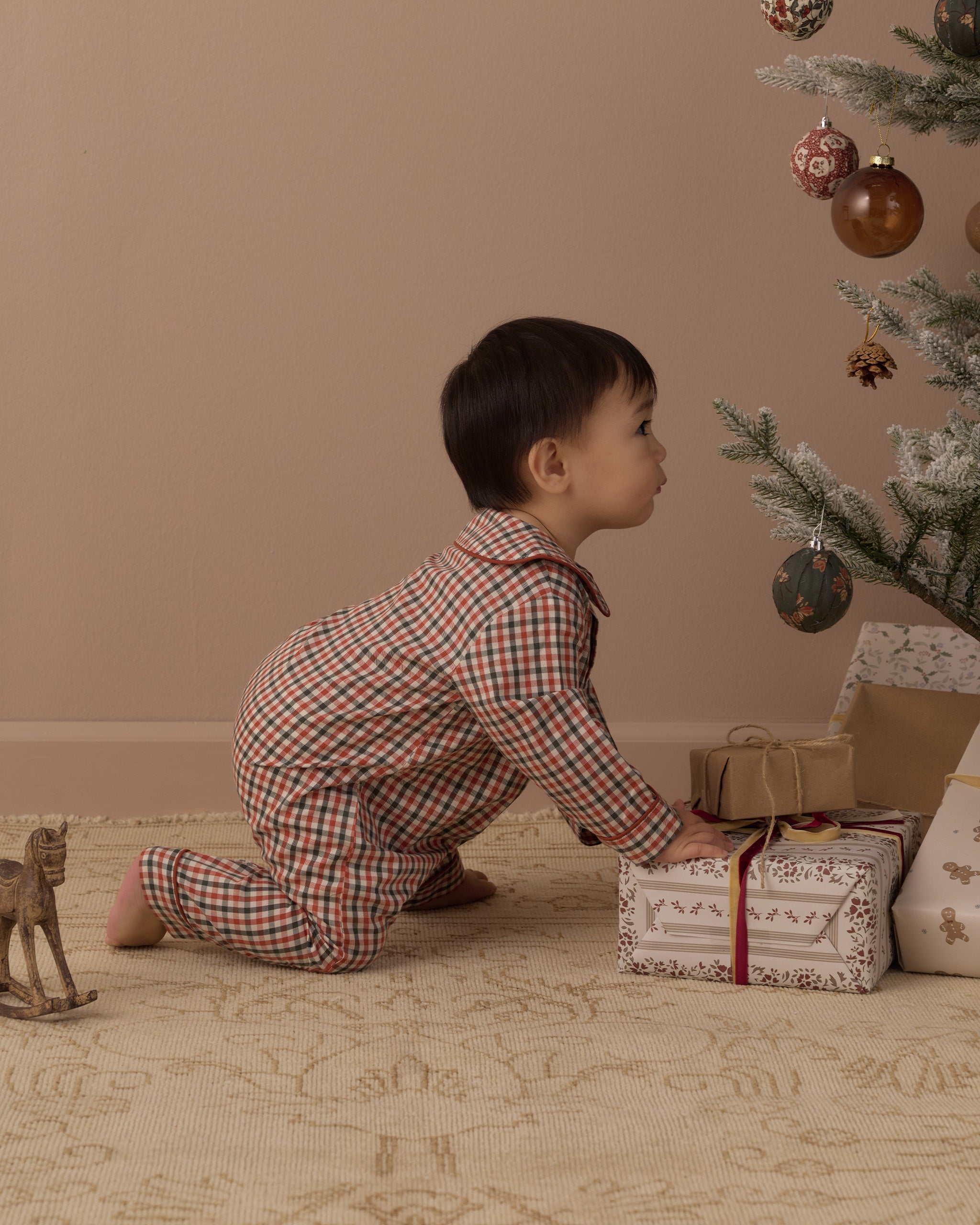 Rylee + Cru Baby Pajama Romper | Holiday Gingham Studio Model Baby