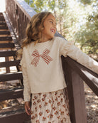 Rylee + Cru Girl's Ruffle Long Sleeve Tee | Bow Lifestyle Photo Model Portrait Details