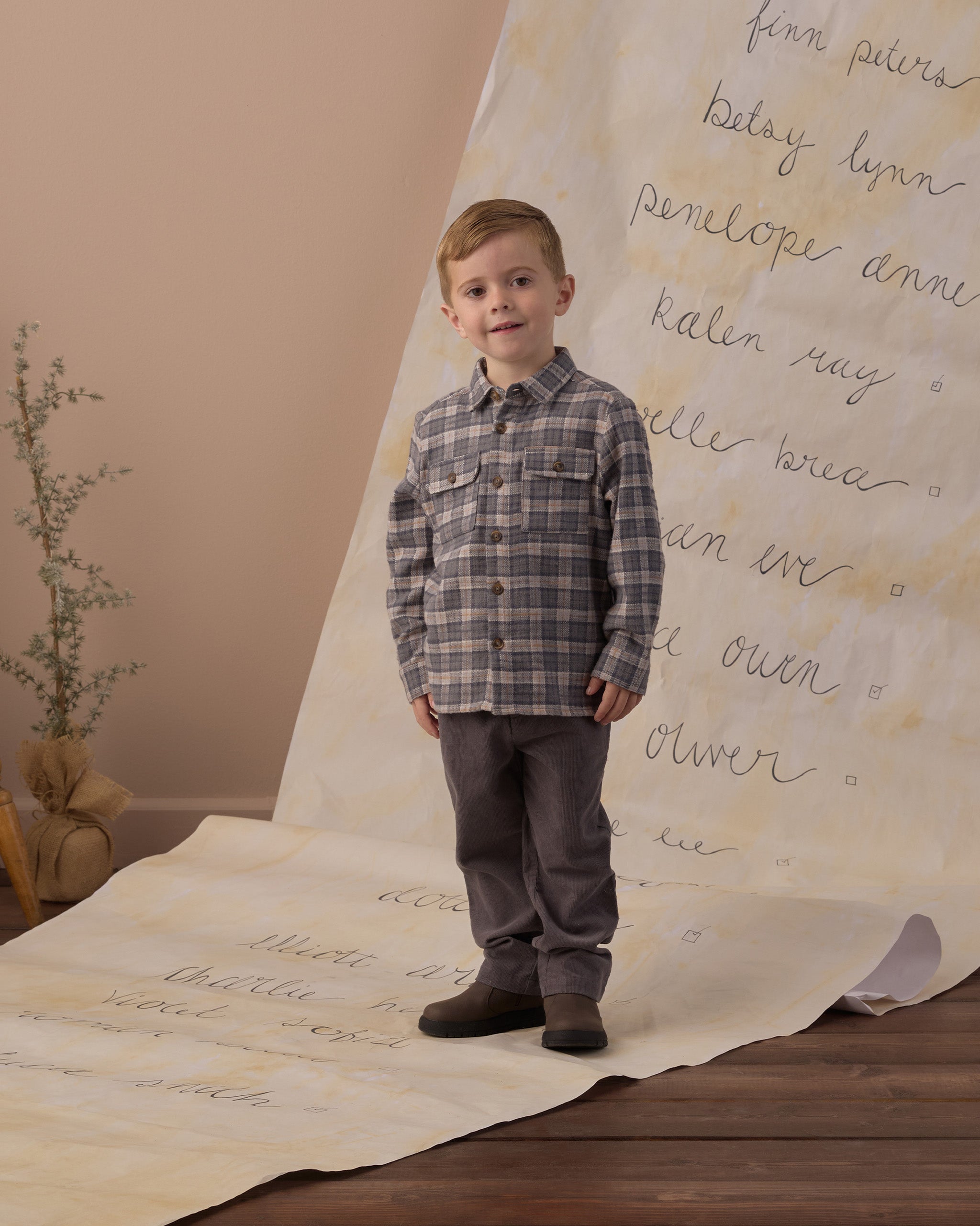 boy wearing Rylee + Cru Pocketed Flannel Shirt | Winter Plaid and Rylee + Cru Kalen Pant | Slate