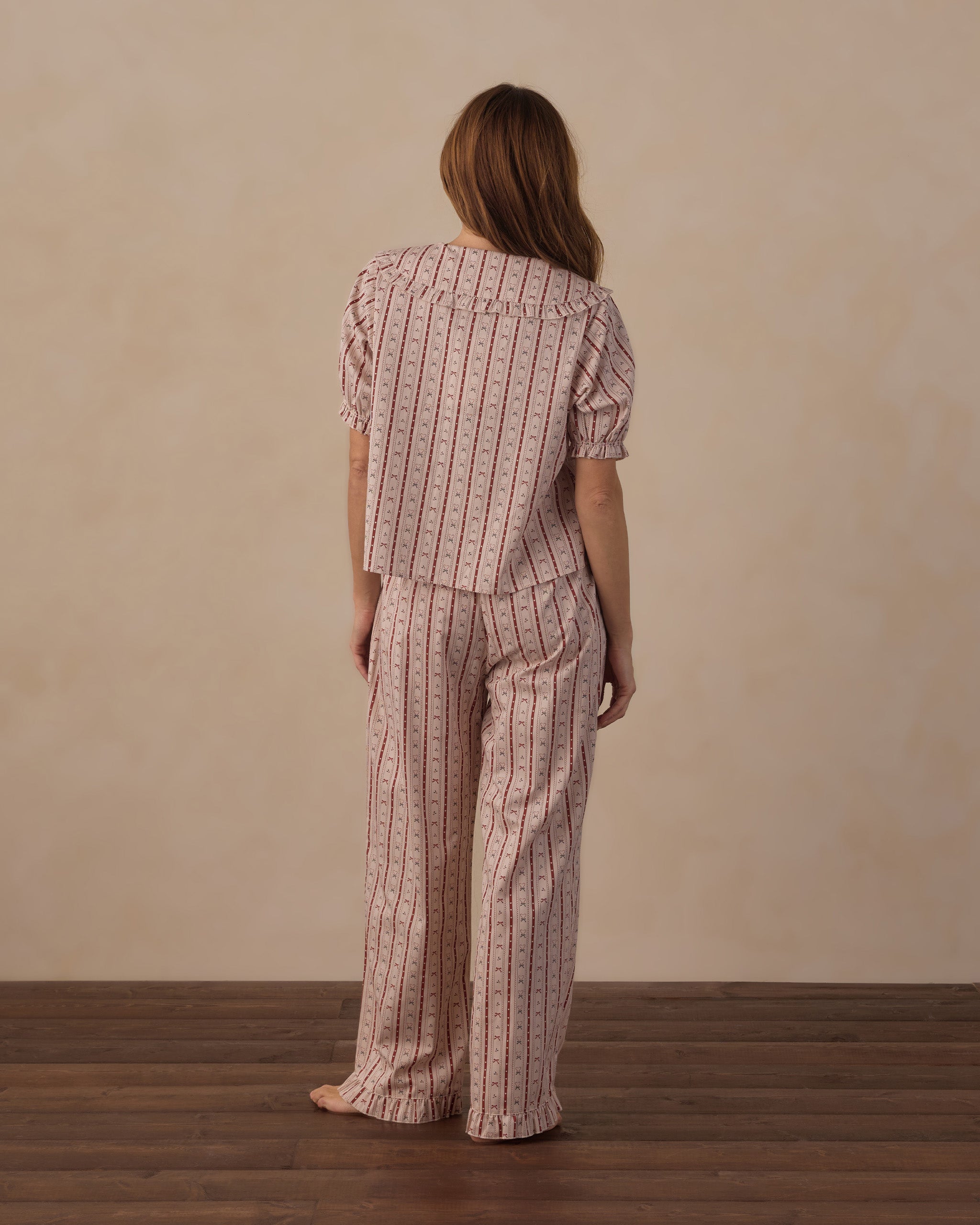 Model Back View of Rylee + Cru Women's Ruffle Pajamas | Candy Cane Lane