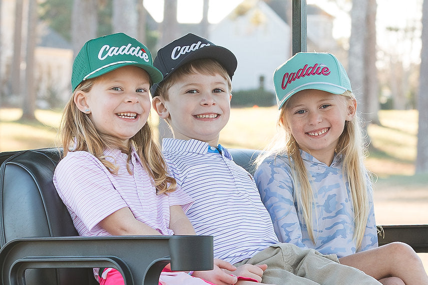 Youth Caddie Performance Rope Hat | White & Navy lifestyle model photo