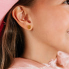Close up photo of girl wearing Pierced Co. Classic Ghost Earring