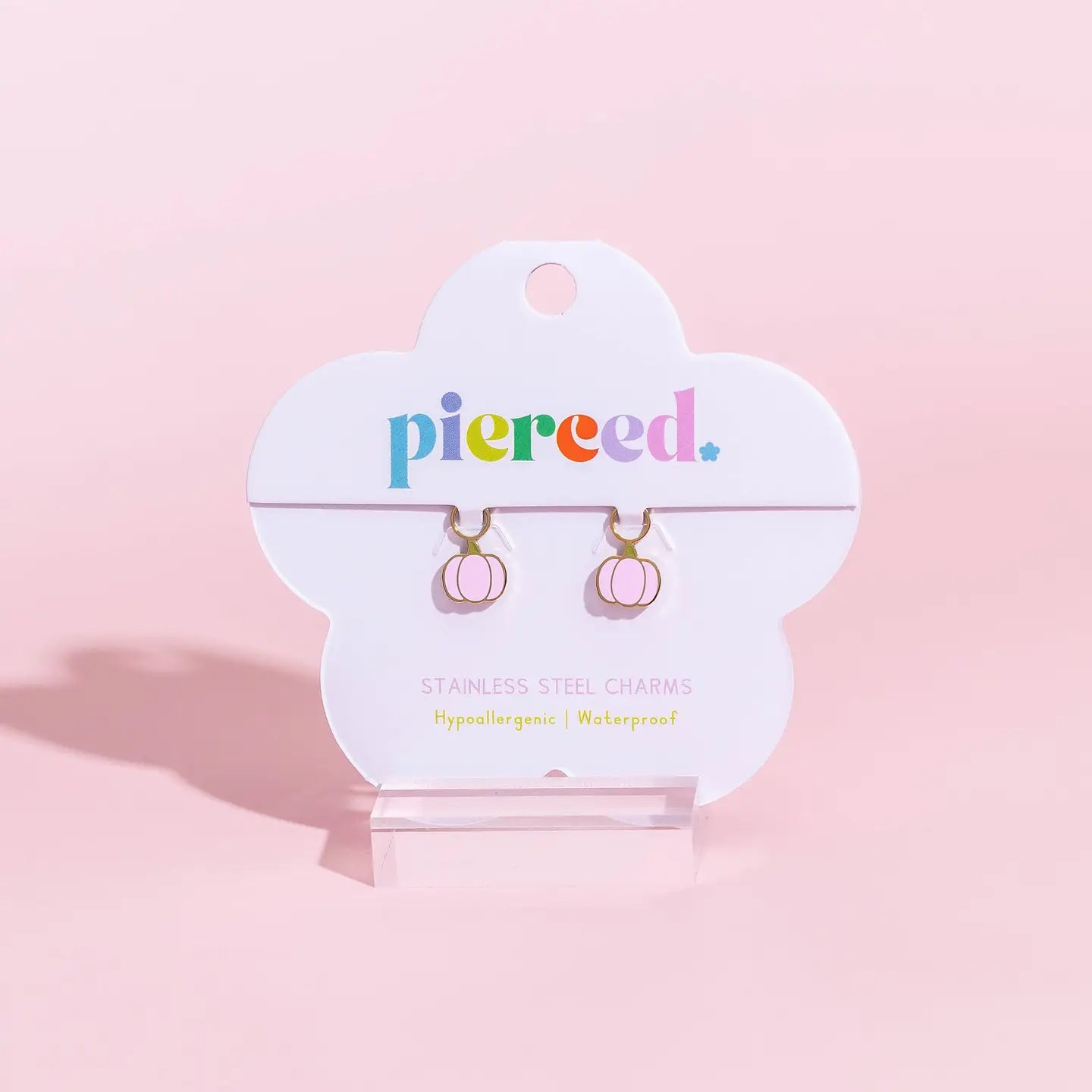 Pierced Co. Pink Pumpkin Earring Charm flat lay in packaging