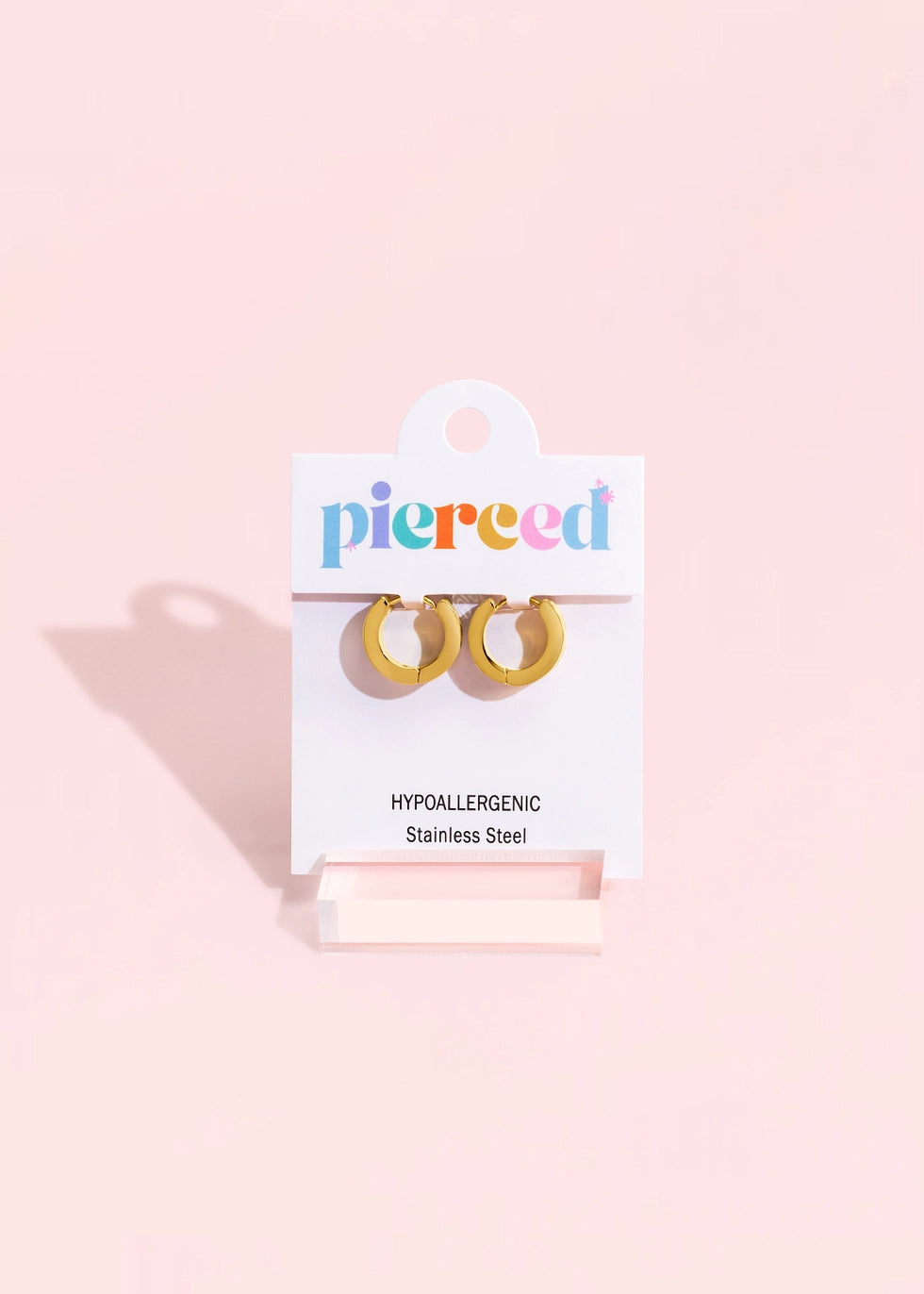 Pierced Co. Cheetah Print Huggies flat lay in packaging