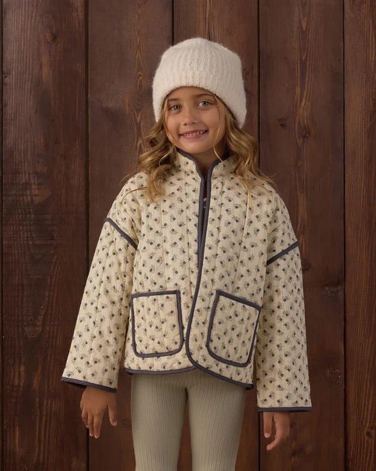 Close-up girl modeling the Rylee + Cru Quilted Jacket | Vintage Fleur