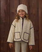 Close-up girl modeling the Rylee + Cru Quilted Jacket | Vintage Fleur