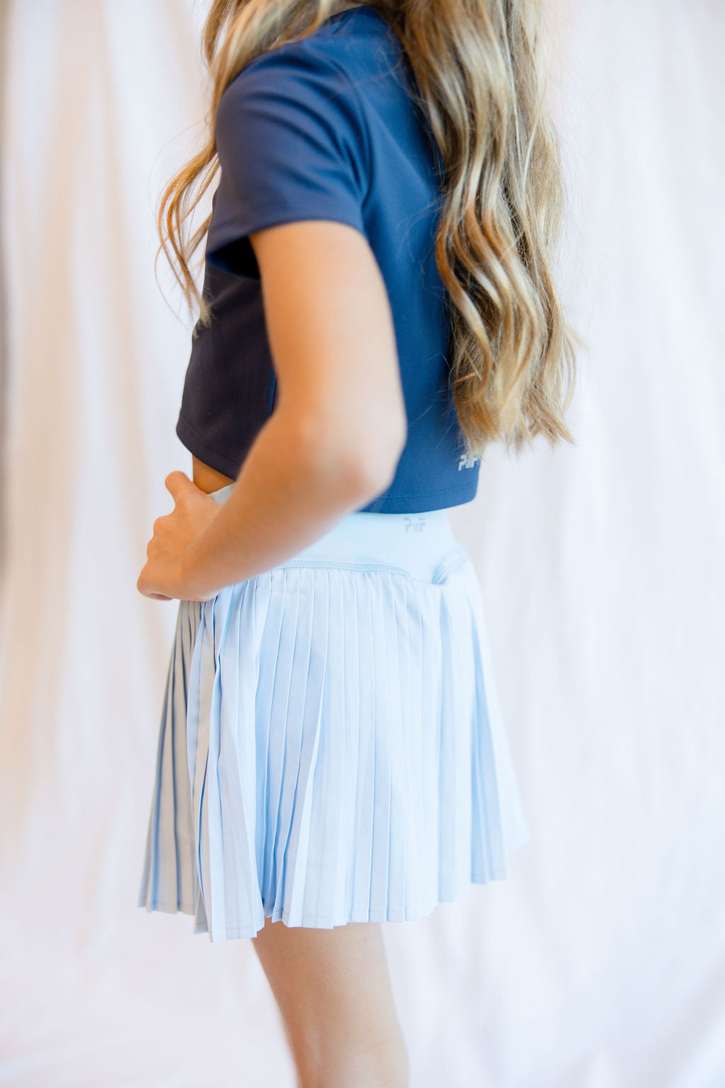 parfum de fit pleaded skirt frost blue up close 