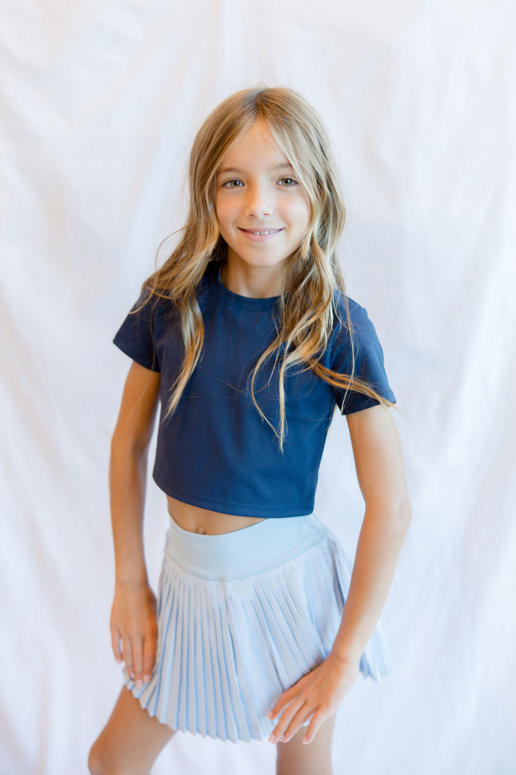 parfum de fit pleaded skirt in frost blue with outfit 