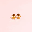 Pierced Co. Cream Bow Earring flat lay