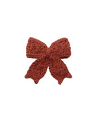 Quincy Mae Baby Crochet Bow in Redwood flat lay