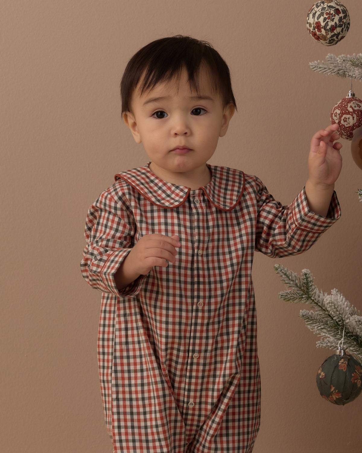 Rylee + Cru Baby Pajama Romper | Holiday Gingham model portrait details