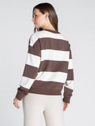 Thread & Supply Stride Top model studio photo, rear angle