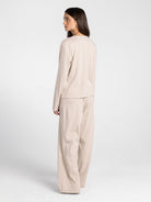 Back side of Thread & Supply Ellery Pajama Set in Cream Taupe Stripe model photo